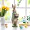 Glitzhome® 15.75" Easter Resin Bunny Boy with Flowers Table Decor